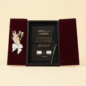 Burgundy marriage contract book with gold lines