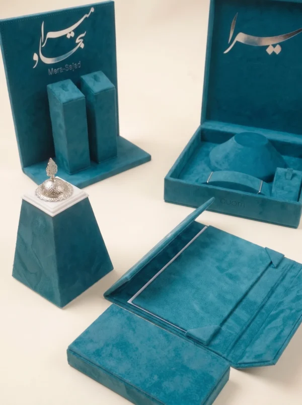 Couples gifts jewelry box open showing necklace display bust next to keepsake burner with silver dome lid