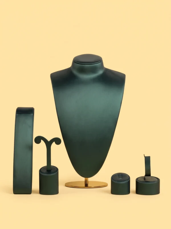 Jewelry box near me alternative: dark green leather-look display set with bust on gold base and stands
